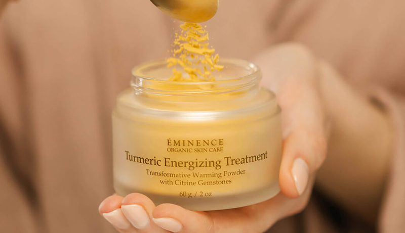 blog-article Woman holding Turmeric Energizing Treatment